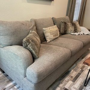 Grey 3 cushion sofa with arms! Deep and great for small space.